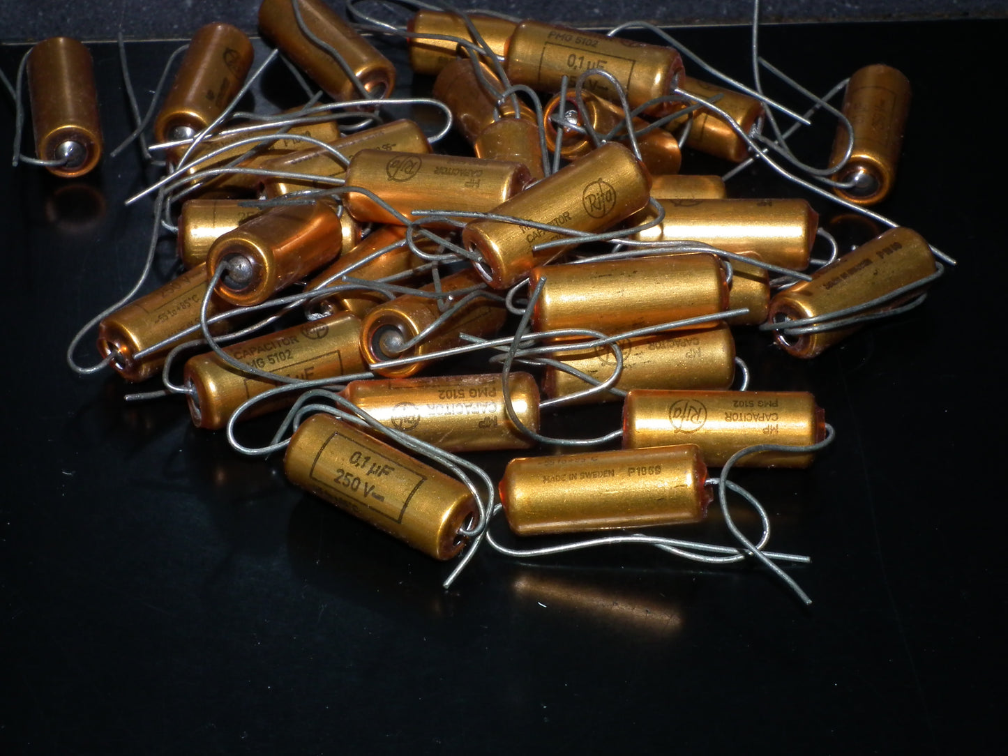 Two NOS MP capacitors 0.1 uF 250V Rifa Sweden PIO