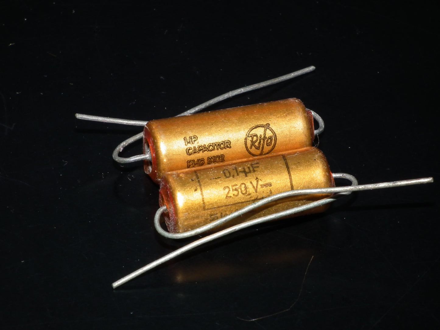 Two NOS MP capacitors 0.1 uF 250V Rifa Sweden PIO