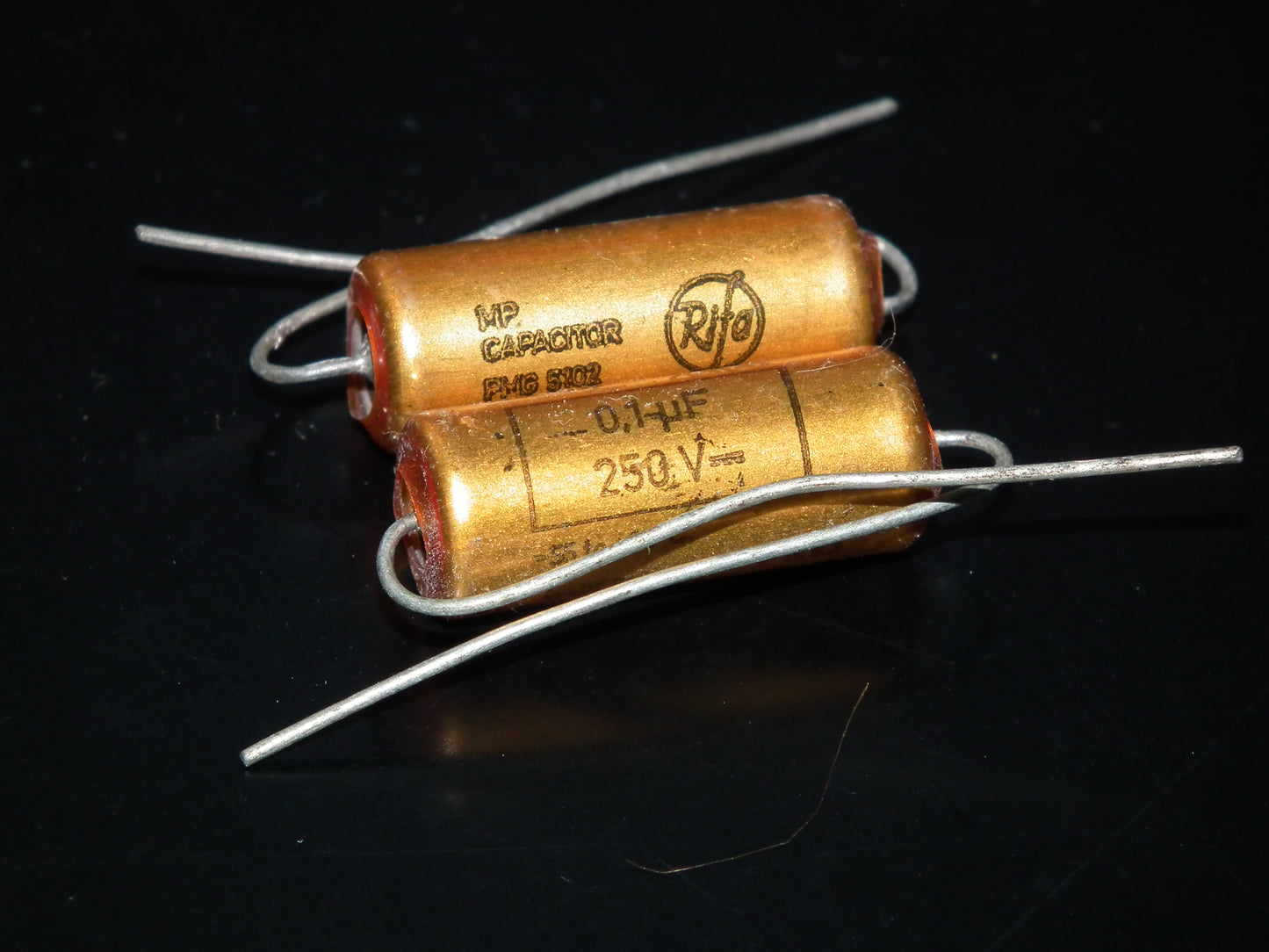 Two NOS MP capacitors 0.1 uF 250V Rifa Sweden PIO