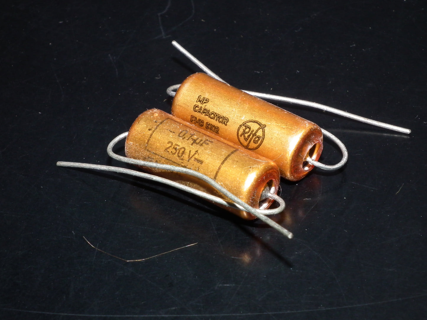 Two NOS MP capacitors 0.1 uF 250V Rifa Sweden PIO