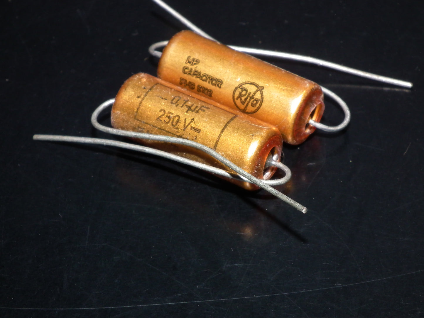 Two NOS MP capacitors 0.1 uF 250V Rifa Sweden PIO