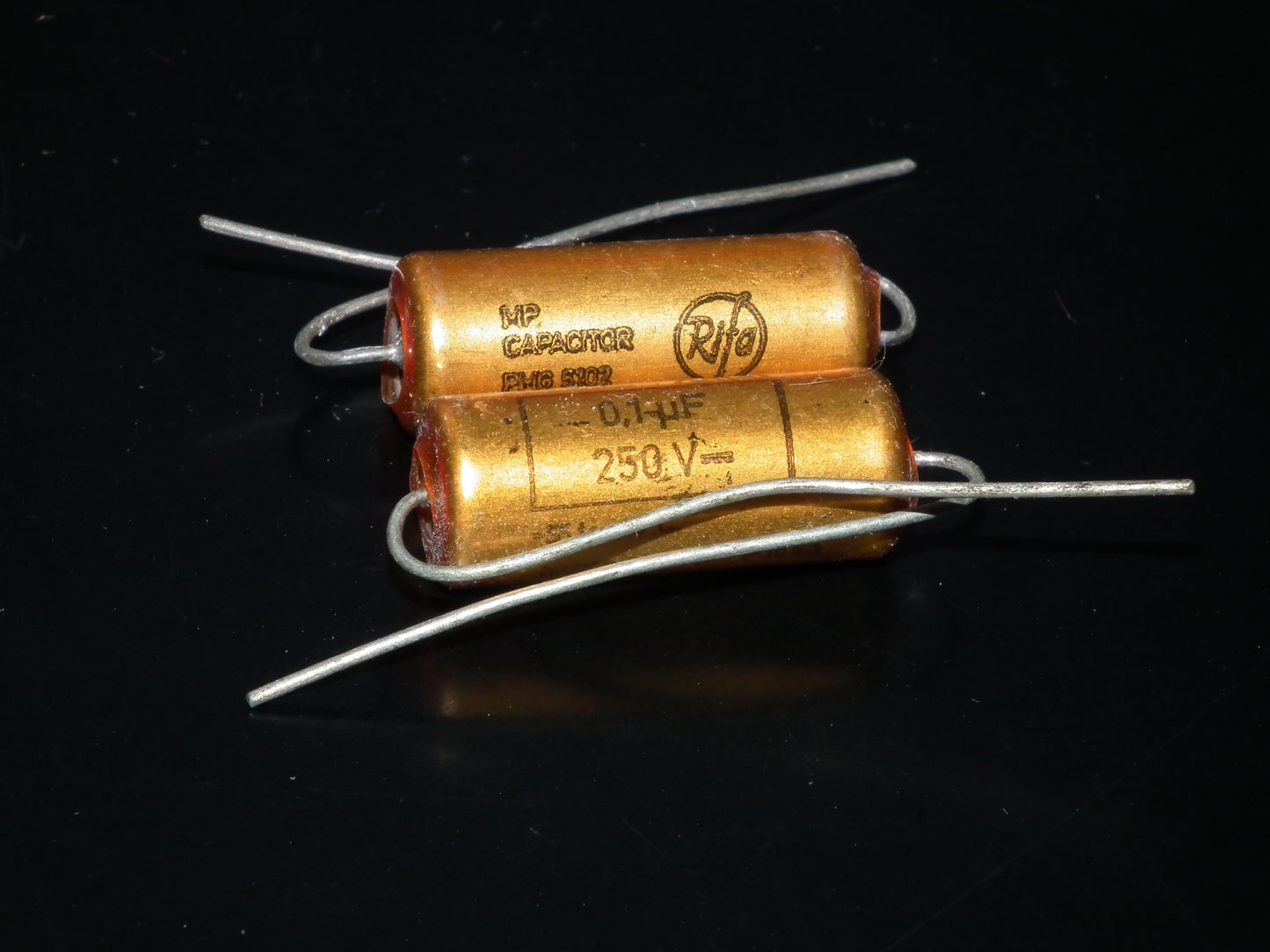 Two NOS MP capacitors 0.1 uF 250V Rifa Sweden PIO