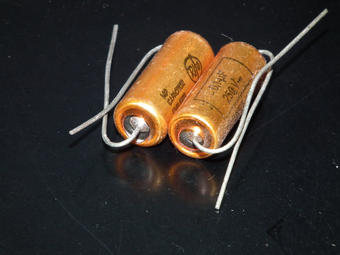 Two NOS MP capacitors 0.1 uF 250V Rifa Sweden PIO
