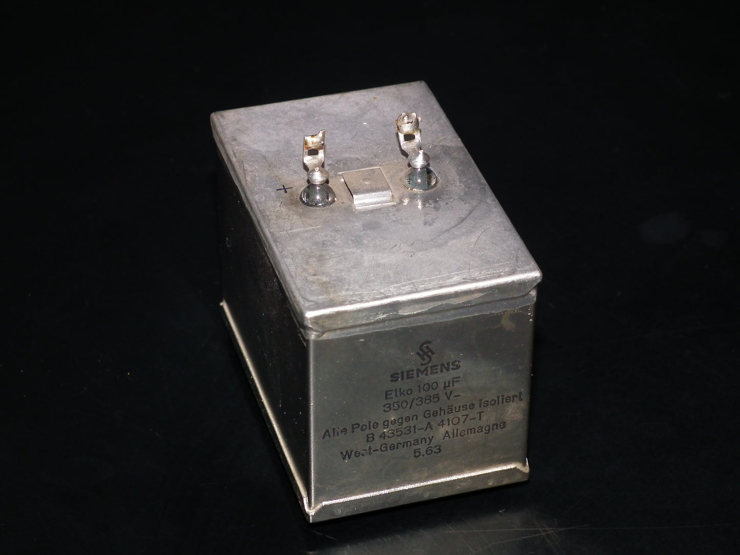 Siemens Klangfilm Electrolytic capacitor 100uF 385V Glass end seal 60s