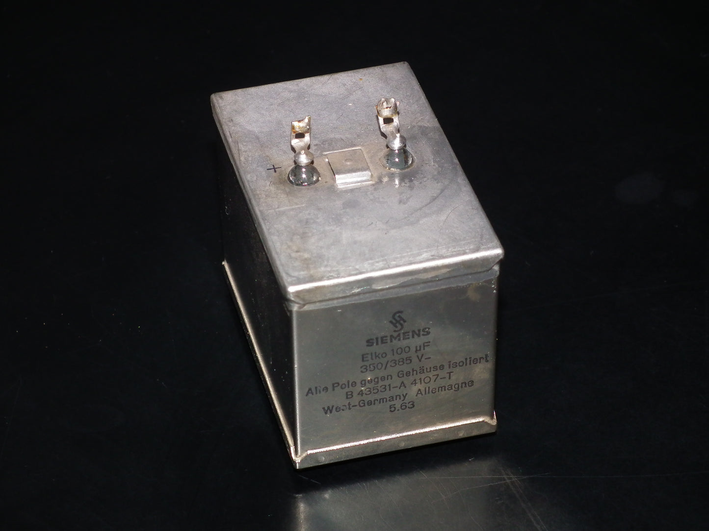 Siemens Klangfilm Electrolytic capacitor 100uF 385V Glass end seal 60s