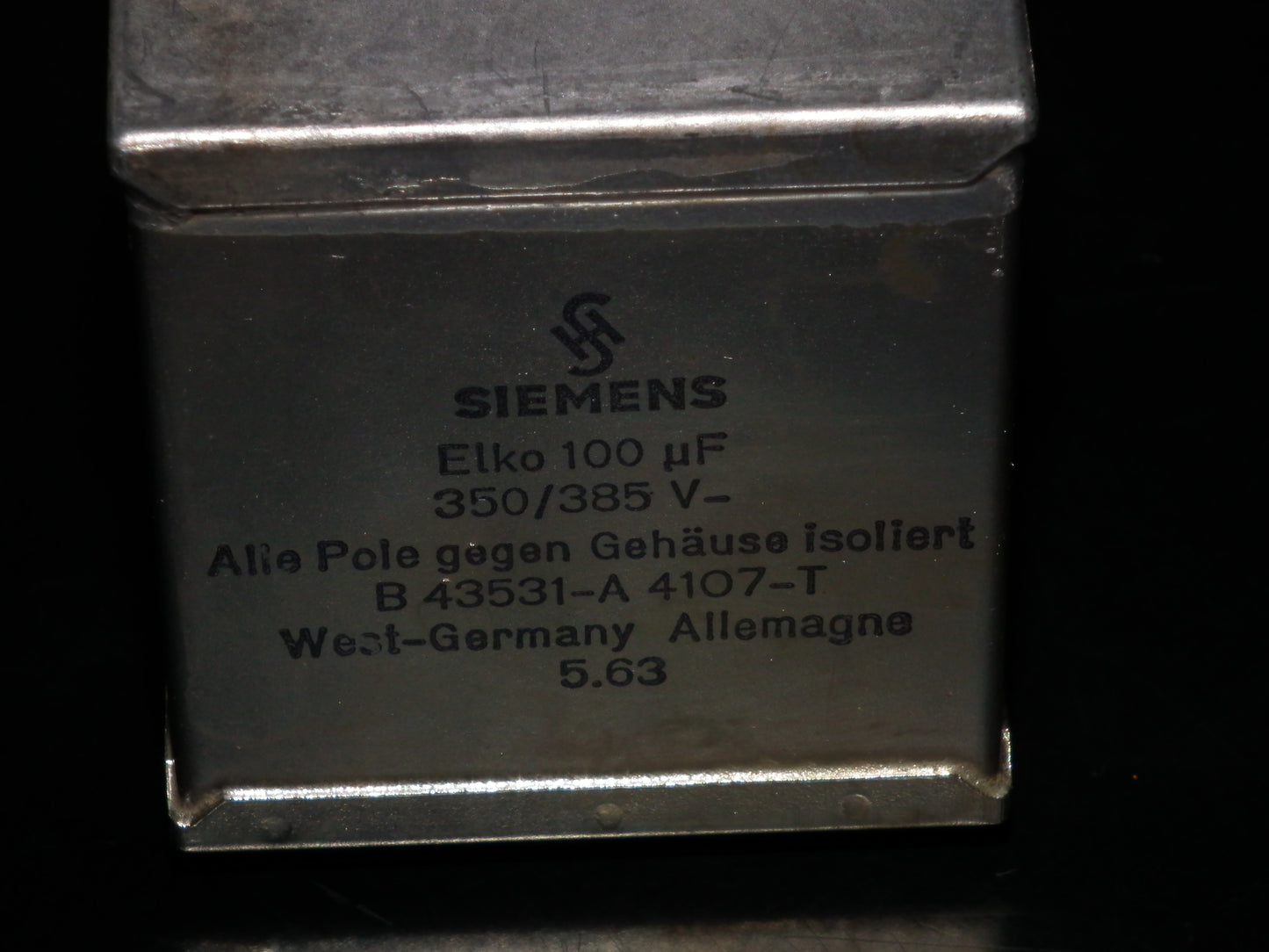 Siemens Klangfilm Electrolytic capacitor 100uF 385V Glass end seal 60s