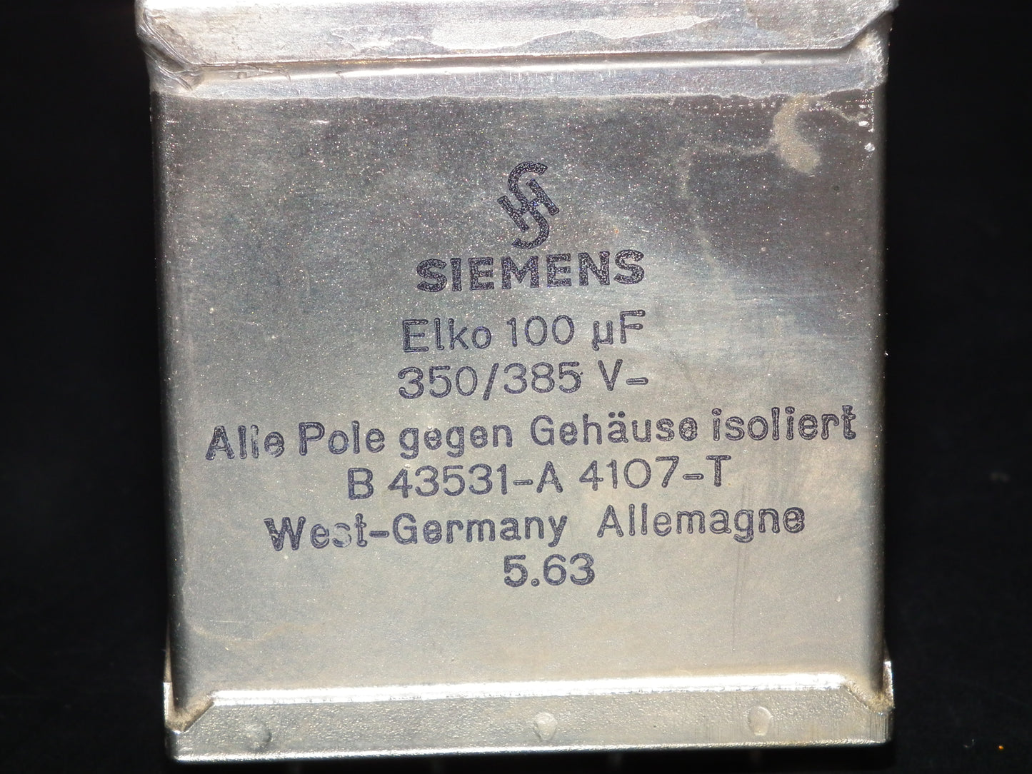 Siemens Klangfilm Electrolytic capacitor 100uF 385V Glass end seal 60s