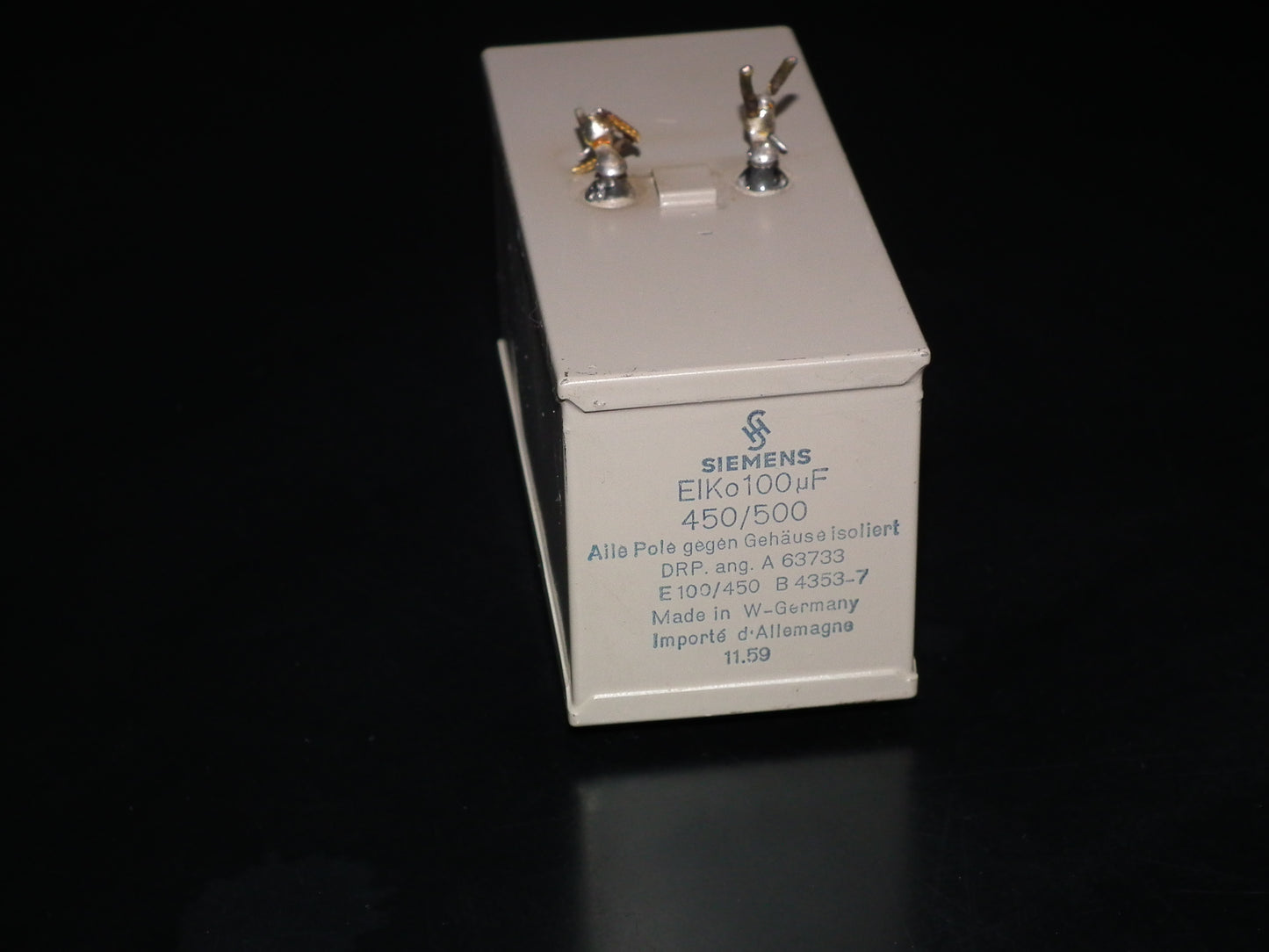 Siemens Klangfilm Electrolytic capacitor 100uF 500V Glass end seal 50s