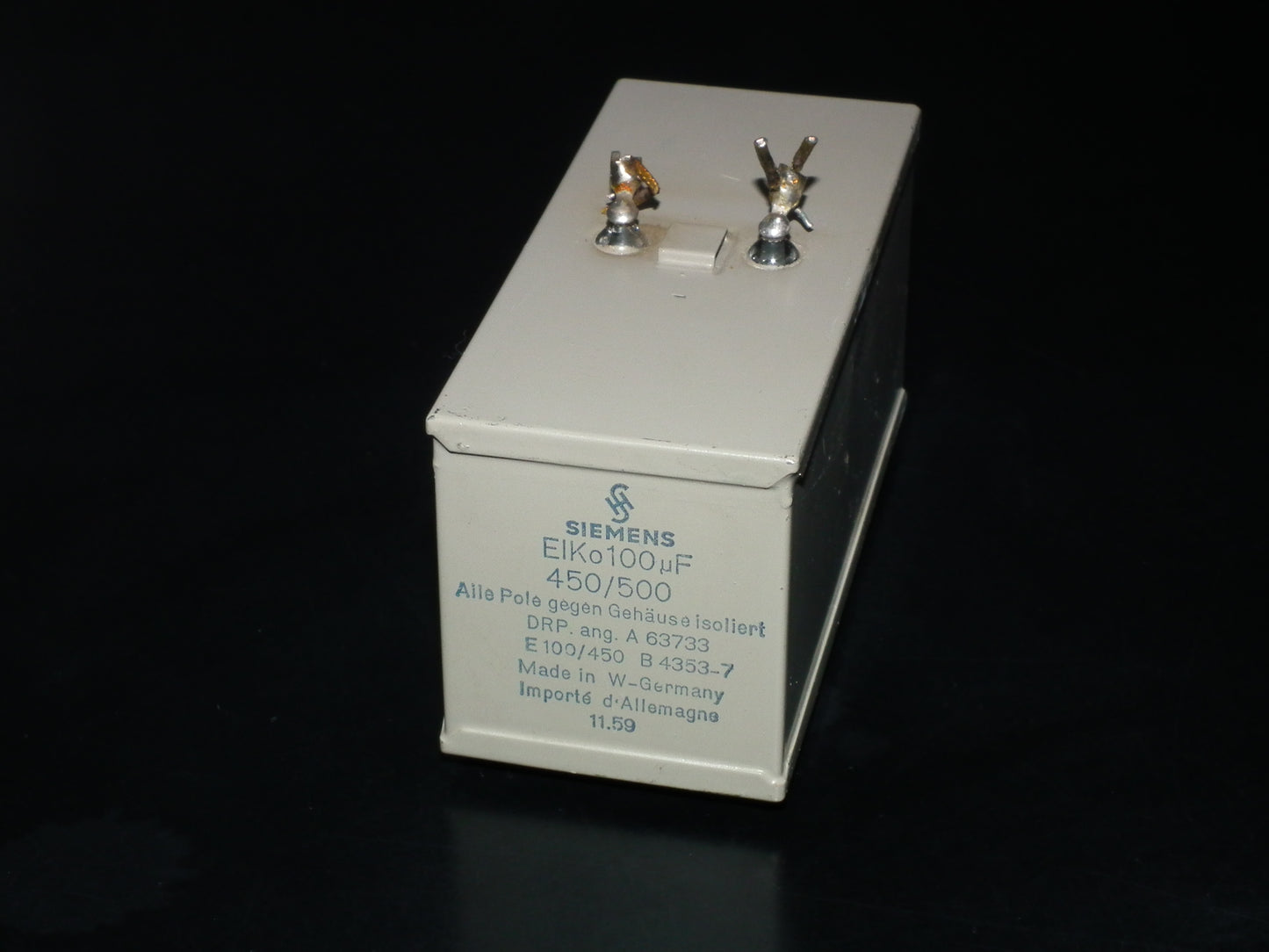 Siemens Klangfilm Electrolytic capacitor 100uF 500V Glass end seal 50s