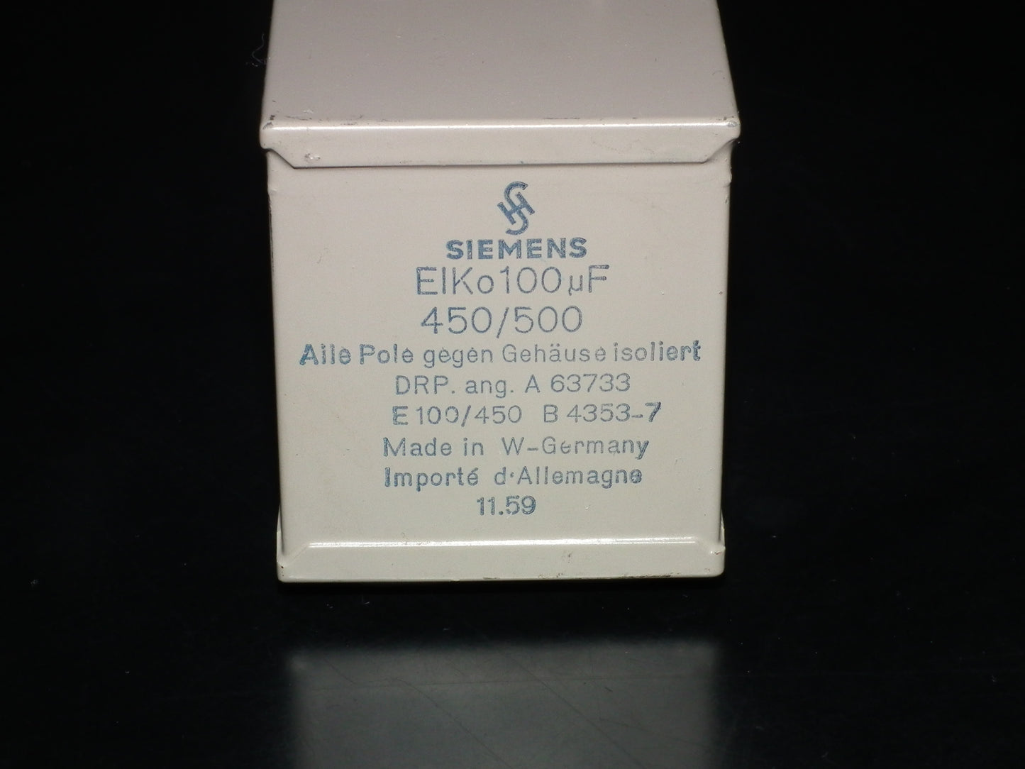 Siemens Klangfilm Electrolytic capacitor 100uF 500V Glass end seal 50s