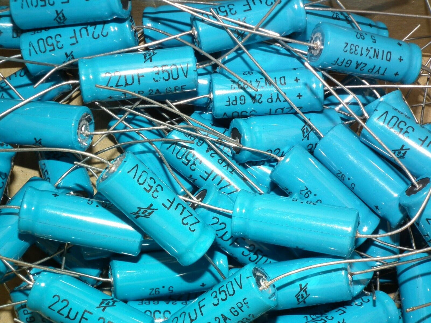 Two vintage NOS F&T electrolytic capacitors 22uF 350V Made in West Germany 70s