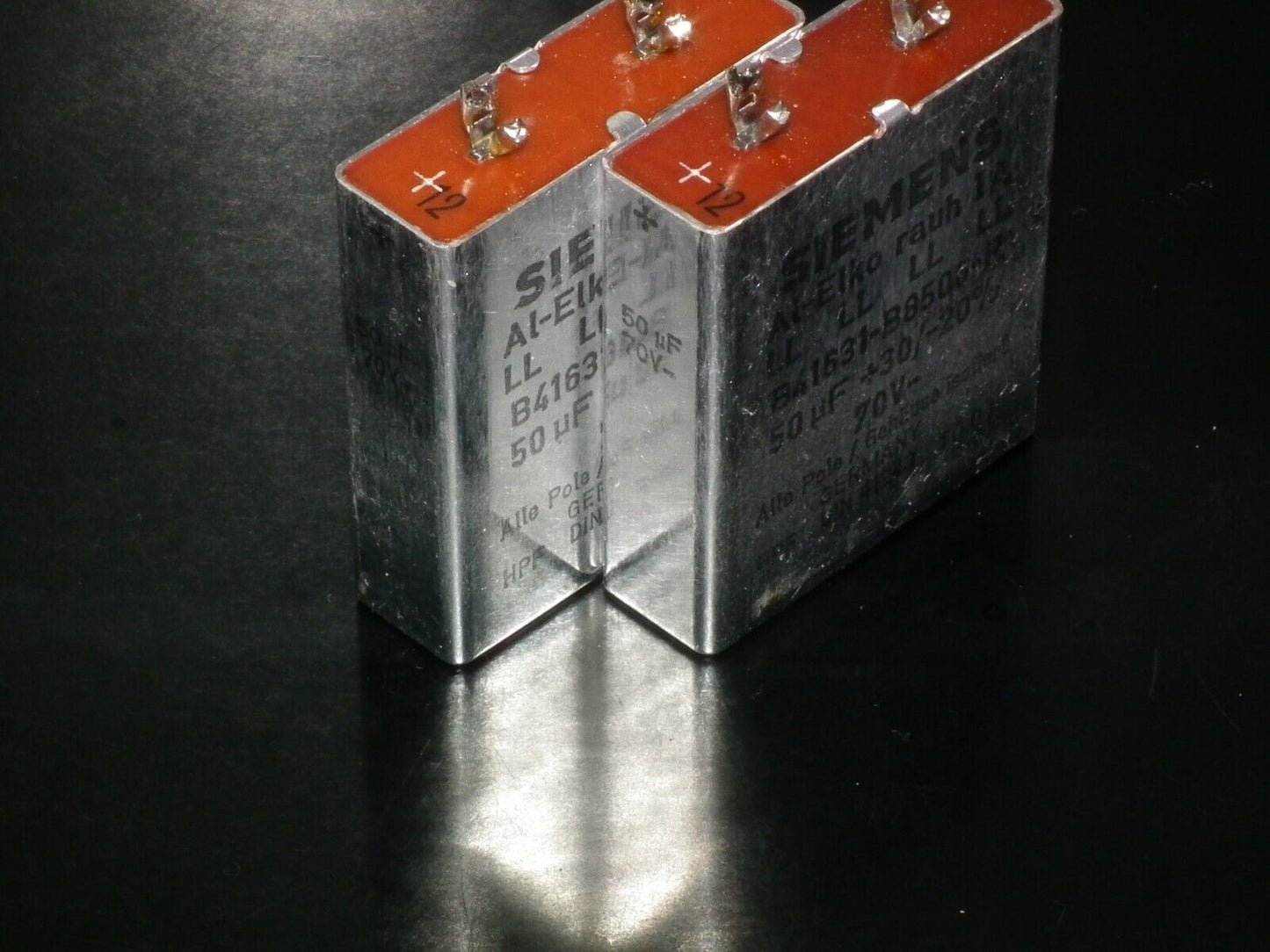 Two vintage Siemens electrolytic capacitors 50uF / 70V Klangfilm "Al-Elko rauh"