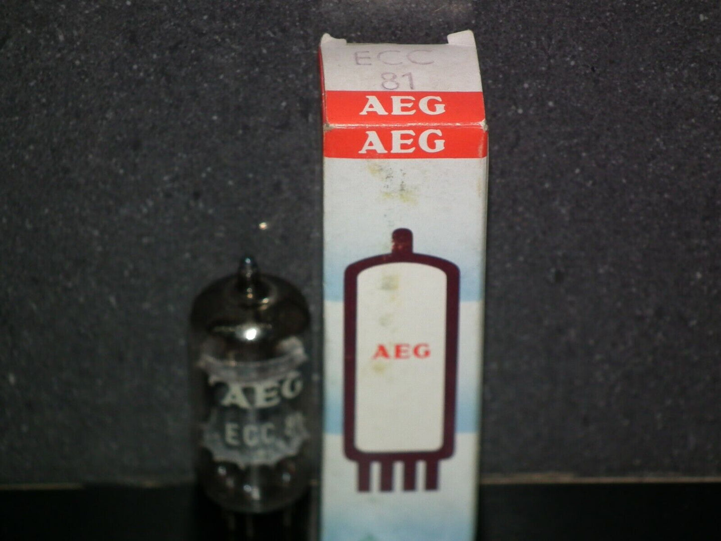 ECC81 12AT7 AEG Germany NOS NIB Telefunken smooth plates 17mm made by EI