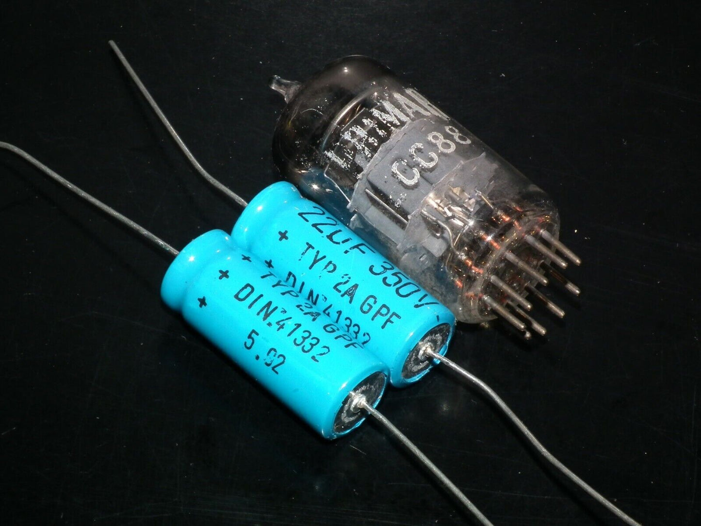 Two vintage NOS F&T electrolytic capacitors 22uF 350V Made in West Germany 70s