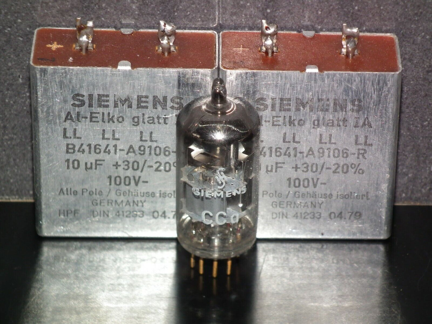 Two vintage Siemens electrolytic capacitors 10uF/100V Klangfilm West Germany 70s