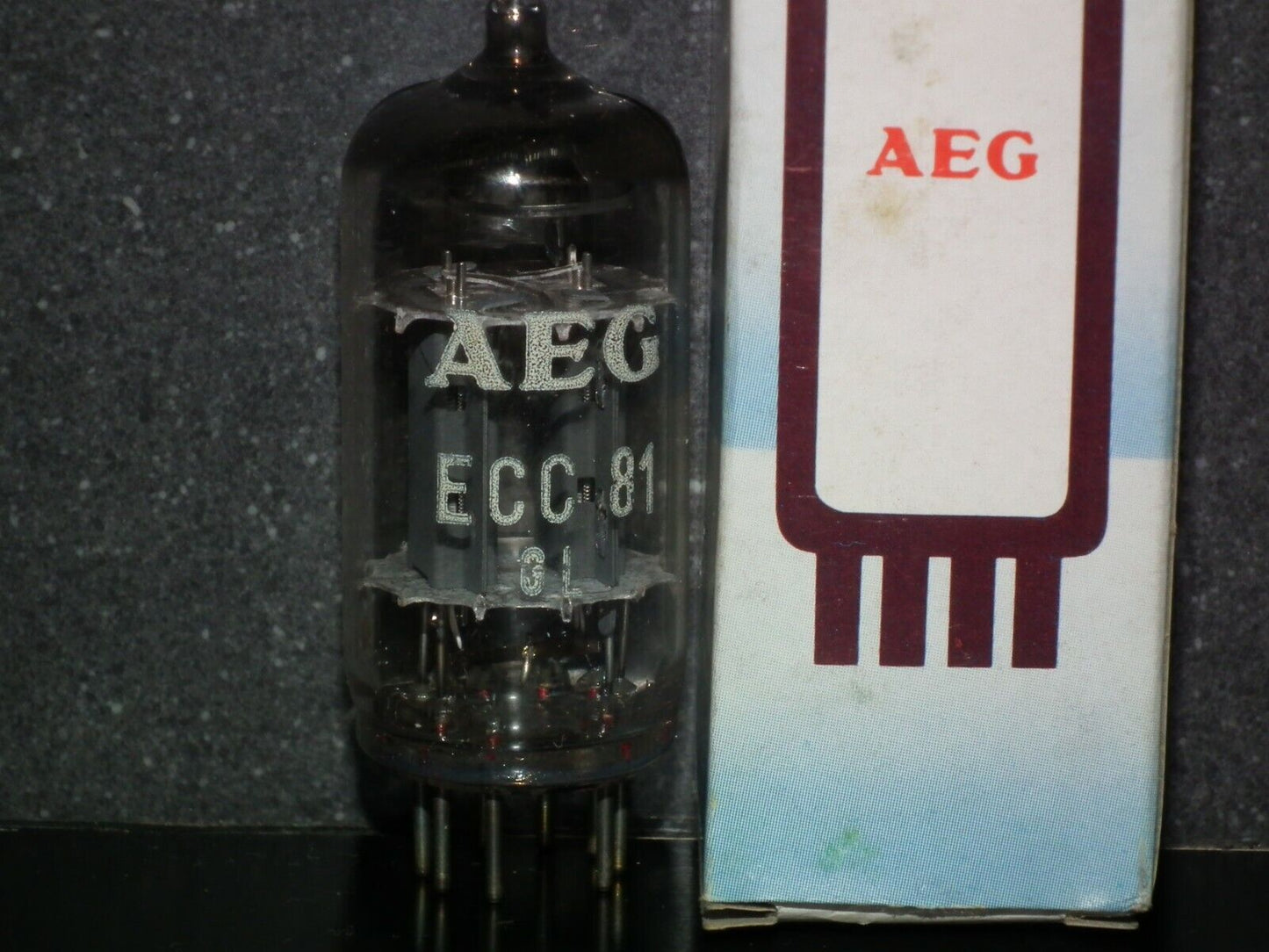 ECC81 12AT7 AEG Germany NOS NIB Telefunken smooth plates 17mm made by EI