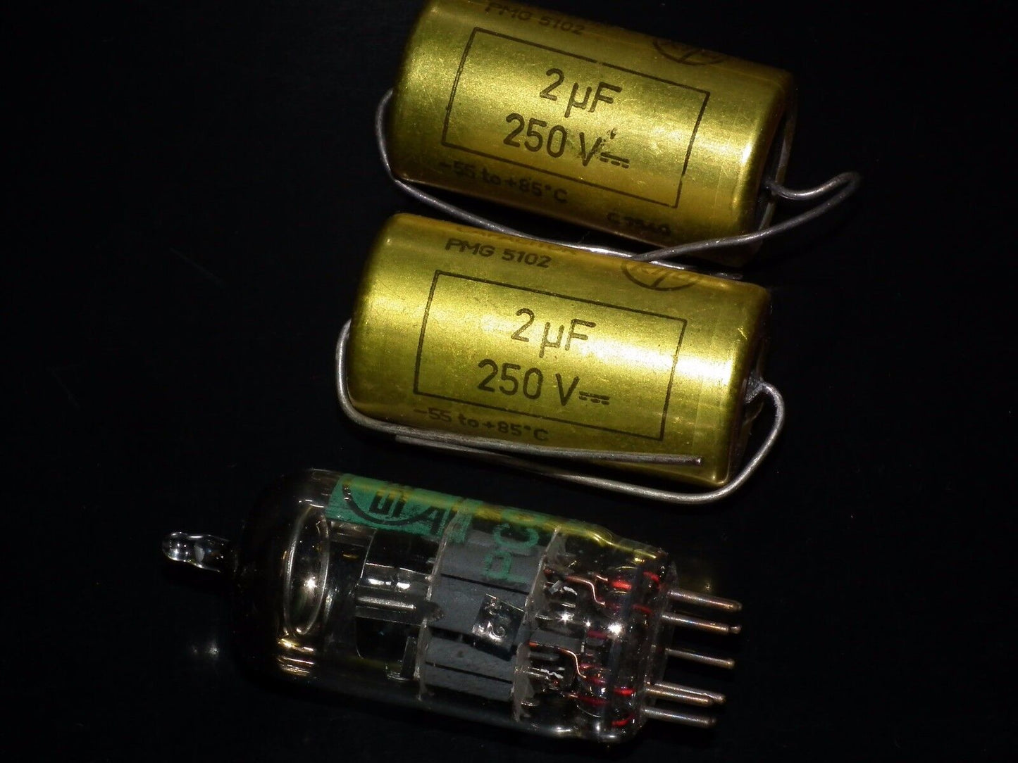 Two vintage NOS MP capacitors 2 uF / 250V Rifa Sweden PIO Paper in oil capacitor