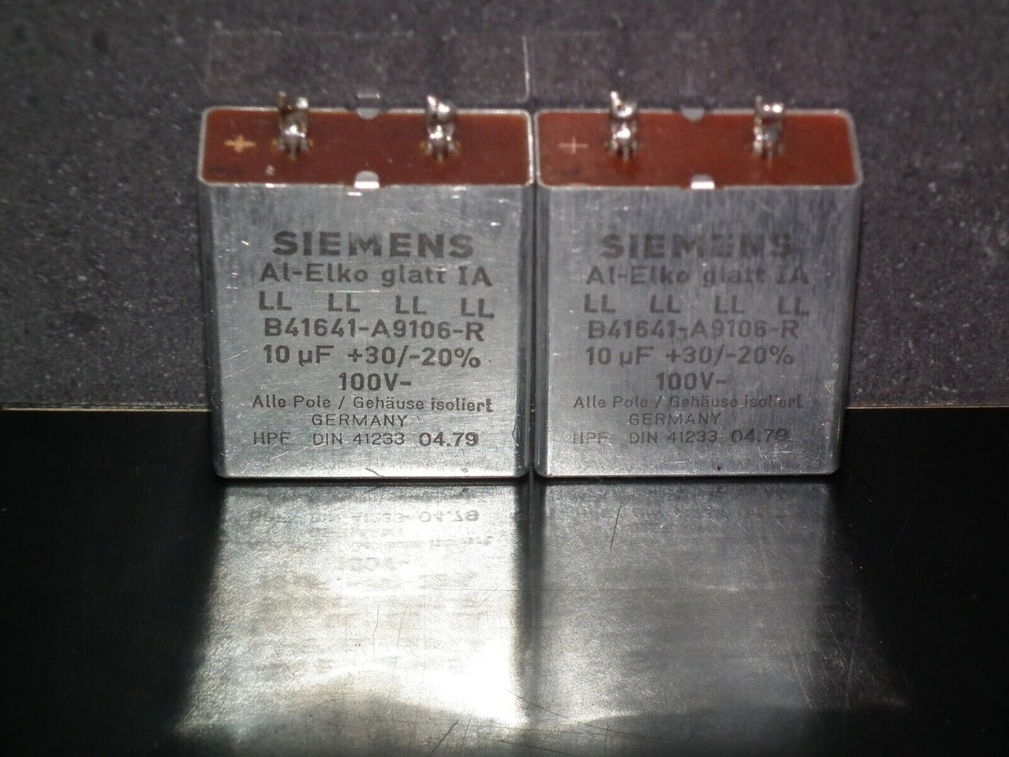 Two vintage Siemens electrolytic capacitors 10uF/100V Klangfilm West Germany 70s
