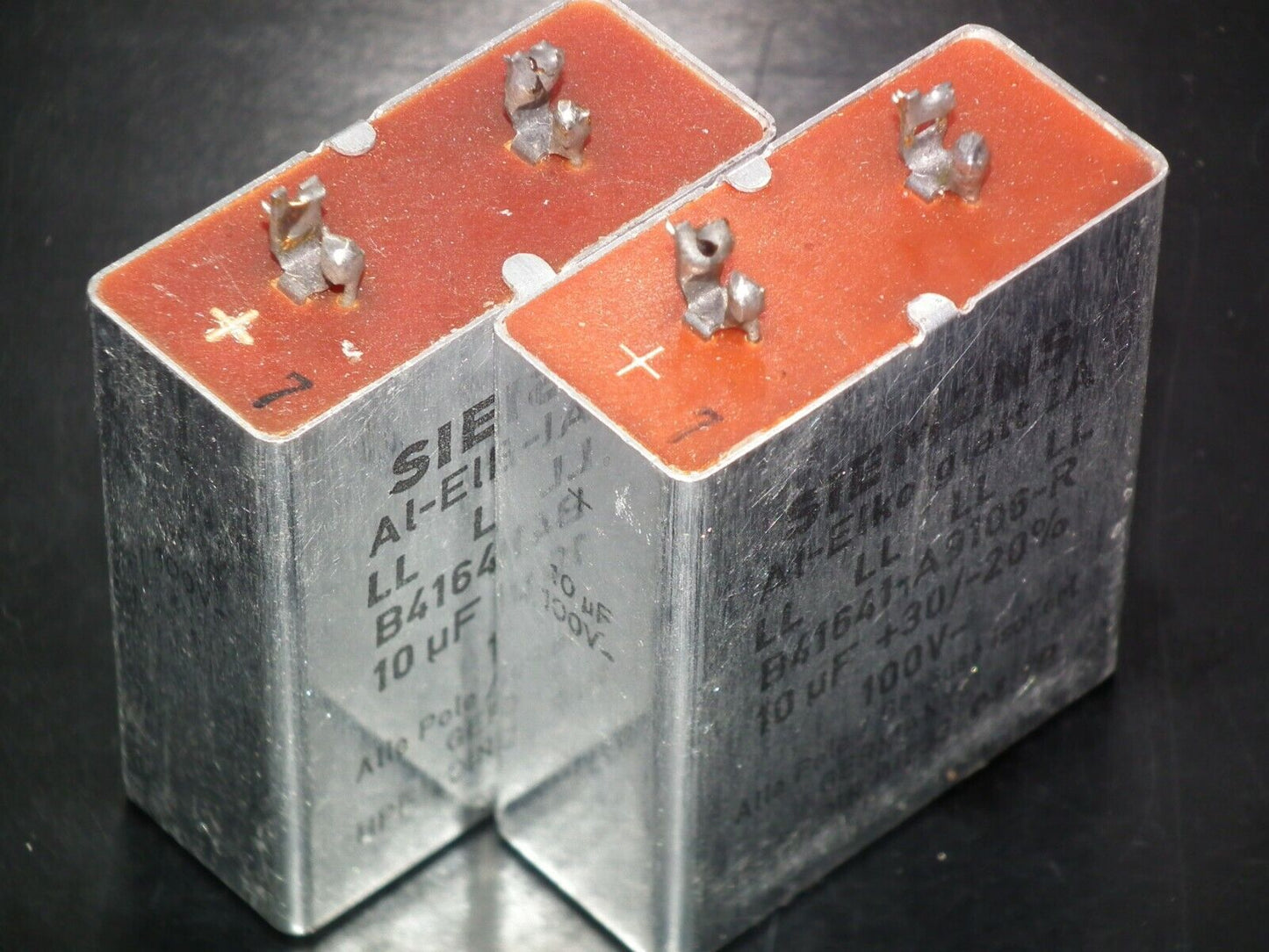 Two vintage Siemens electrolytic capacitors 10uF/100V Klangfilm West Germany 70s