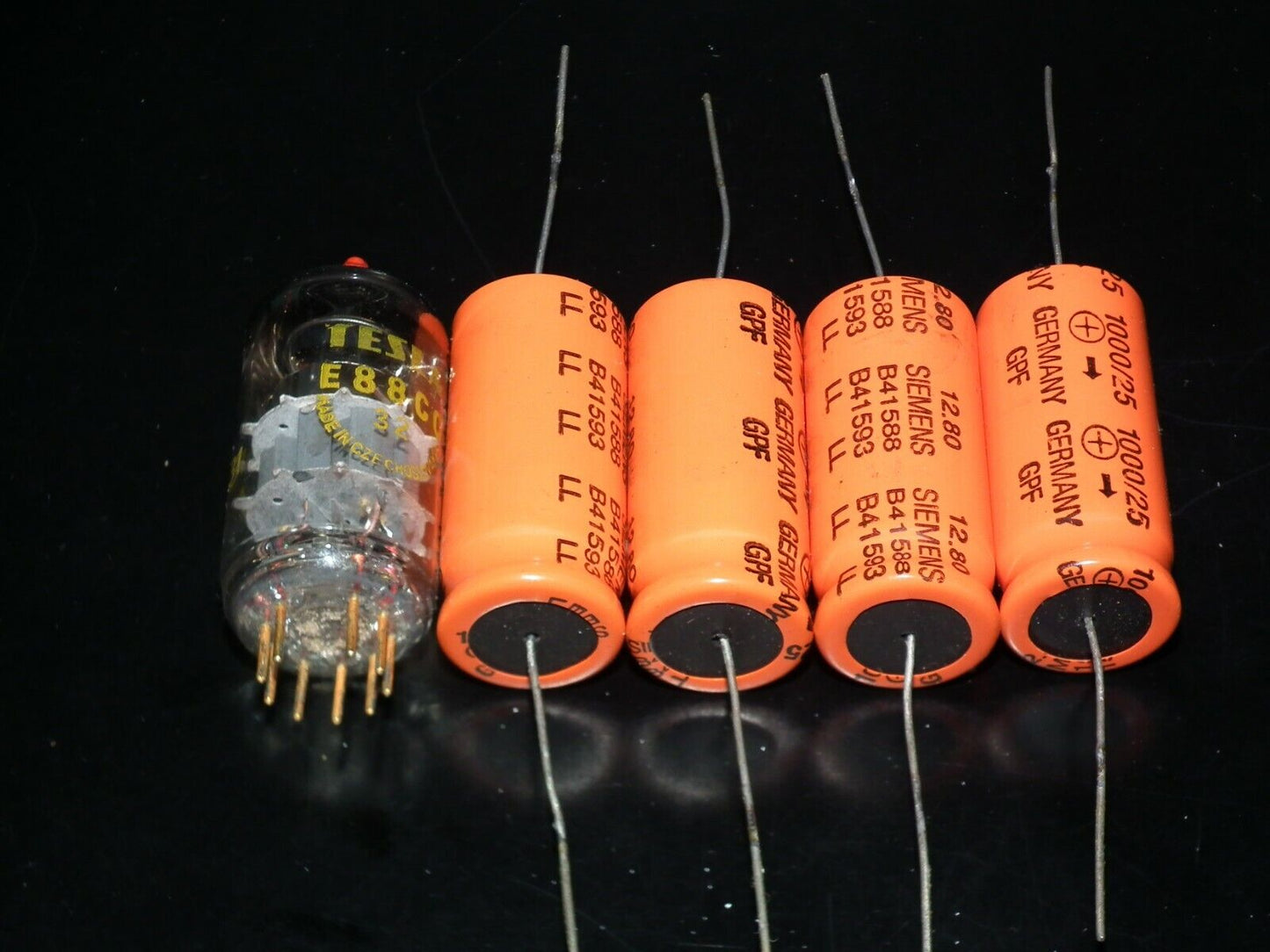 Four vintage NOS electrolytic capacitors 1000uF 25V Siemens W Germany Orange Can
