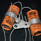 Two (2 pcs) Vintage NOS Capacitors Astron 100uF 6V