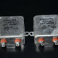 Two NOS WEST CAP SPRAGUE PIO hermetically sealed capacitor 1u 1KV CP53B1EG105K1
