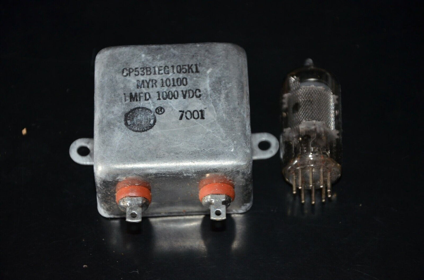 Two NOS WEST CAP SPRAGUE PIO hermetically sealed capacitor 1u 1KV CP53B1EG105K1