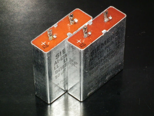 Two vintage Siemens electrolytic capacitors 50uF / 70V Klangfilm "Al-Elko rauh"