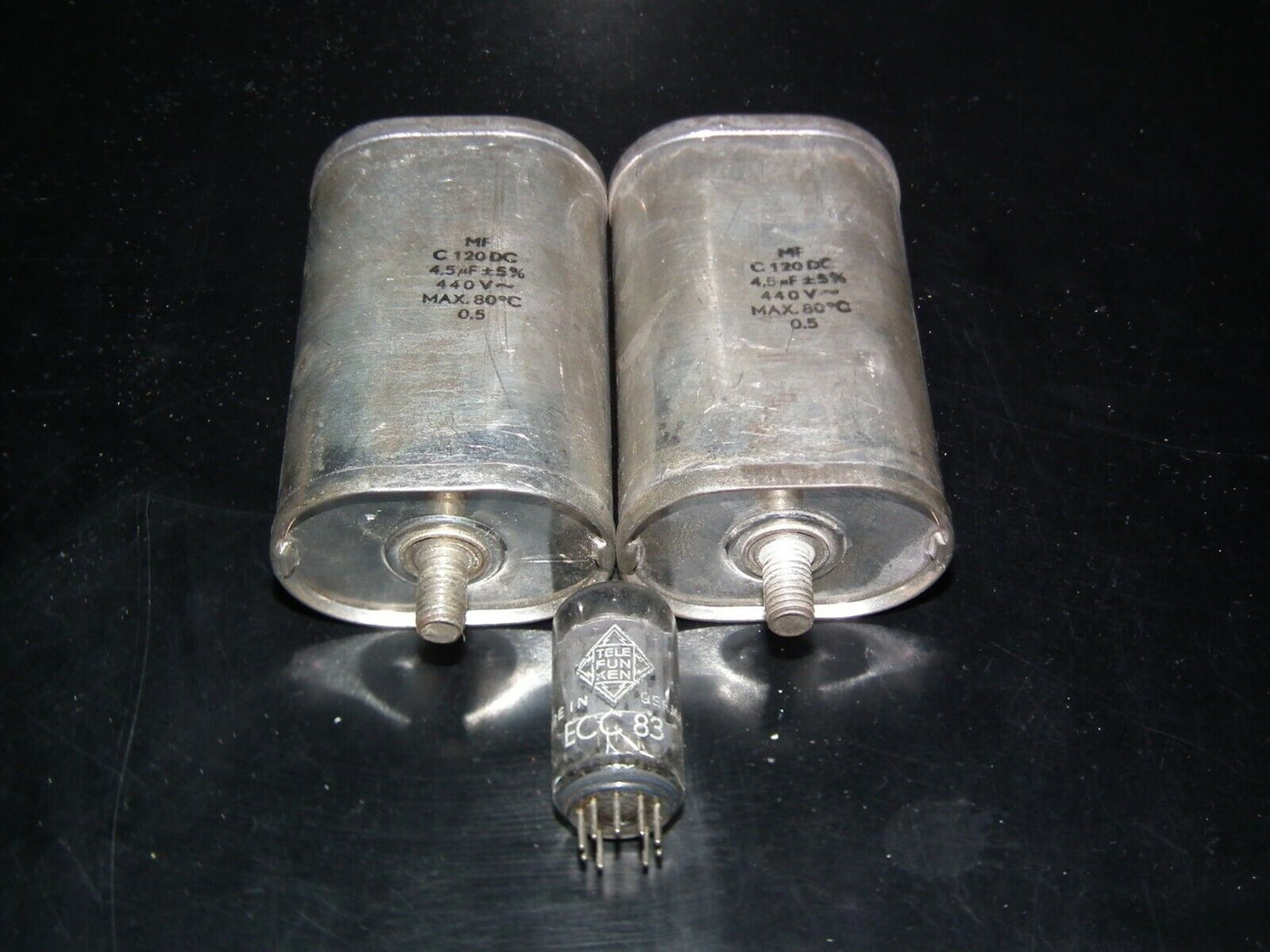 Two vintage PIO capacitors 4.5 uF / 450VAC As is ...