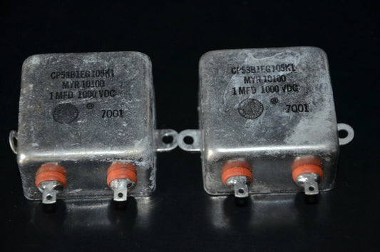 Two NOS WEST CAP SPRAGUE PIO hermetically sealed capacitor 1u 1KV CP53B1EG105K1